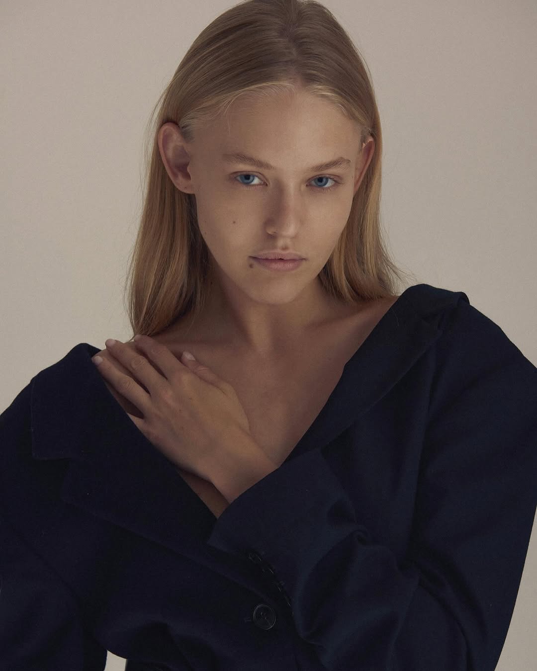 Darina — clean studio portrait, composed